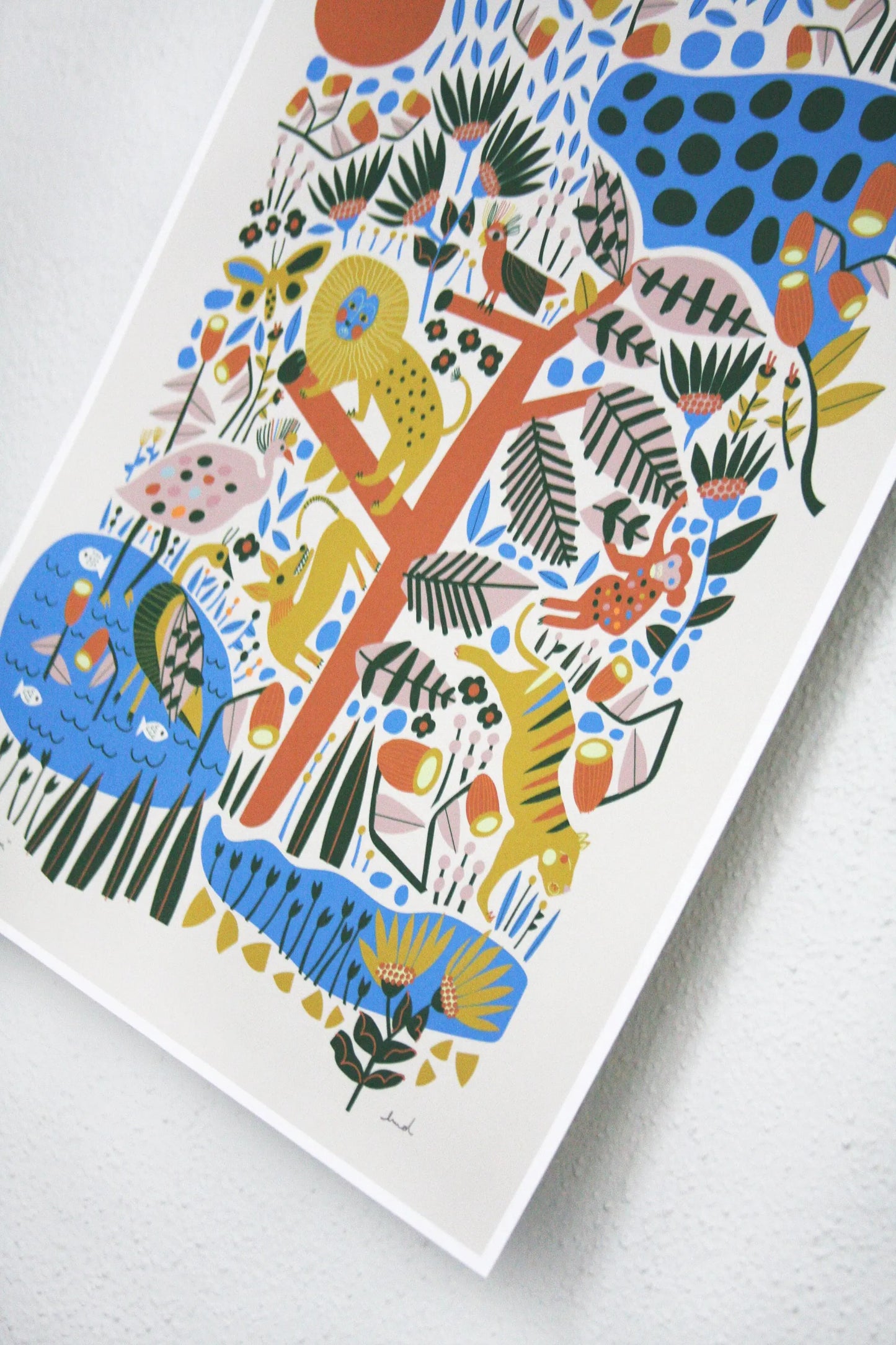 Abstract animal kingdom print featuring geometric lion, birds, and plants in vibrant burnt orange, blue, ochre, and green tones.