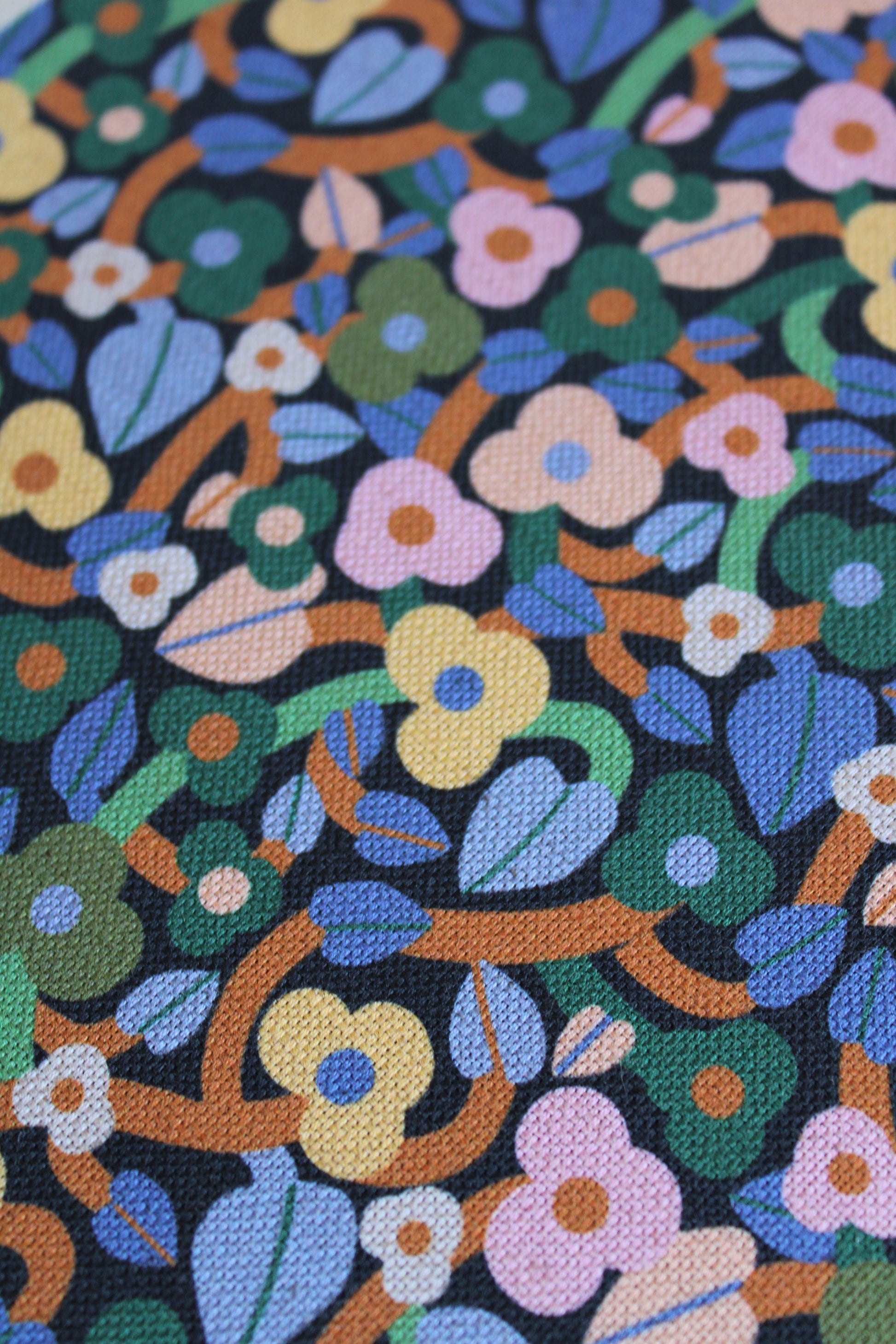 Colorful floral pattern on a dark background