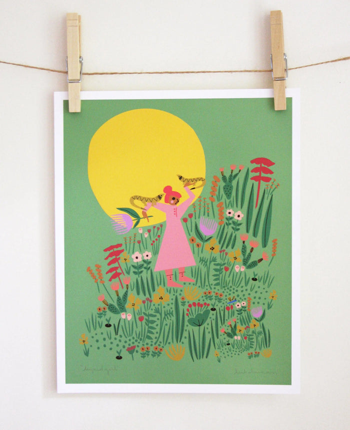 Colorful archival print of a girl in a pink dress surrounded by abstract flowers and plants on avocado background
